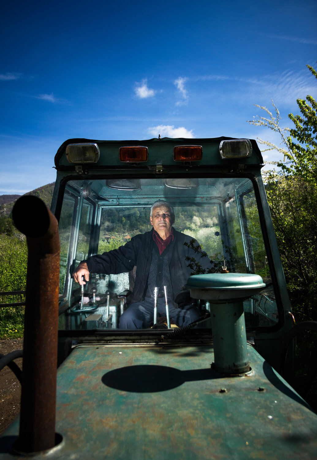 bulldozer, dozer, serbia, marko, radovanovic, djakovo, villager, worker, hardworking, old, male, portrait, cabin, machine, driver, flash, light, Radovanovic Marko