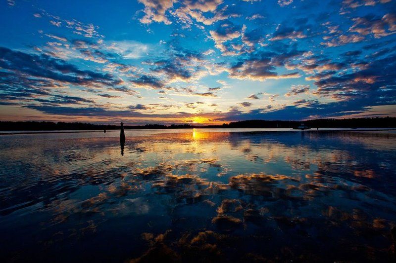 закат, выборг, вода, камни, солнце, небо, облака зеркало фото превью