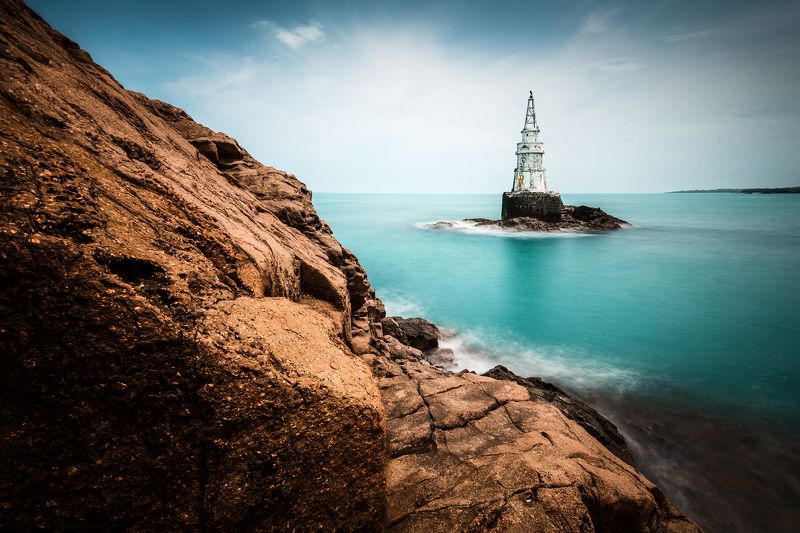 sea,lighthouse, water,rock,clouds,sky,summer,landscape, nature The lighthouse фото превью