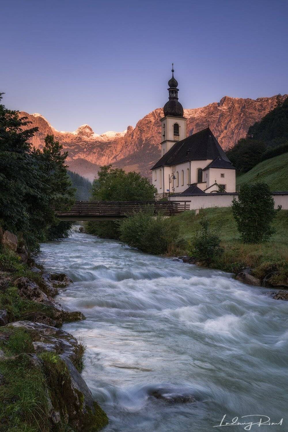 bavaria, bayern, blue, bridge, brook, bushes, church, church tower, currents, flow, fog, forest, germany, grass, green, madow, mist, morning, morning glow, mountains, mountaintop, pink, ramsau, ramsauer kirche, river, rocks, snow, stream, sunrise, tower, , Ludwig Riml