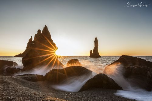 Sunrise on Reinisdrangar. Iceland.