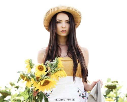 lady and sunflowers