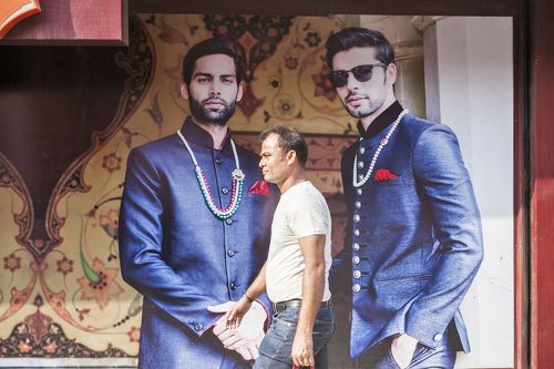 Billboard behind man 