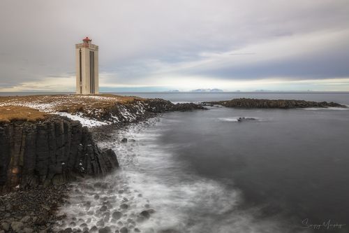 Kalfshamarsviti lighthouse & basalt rocks.