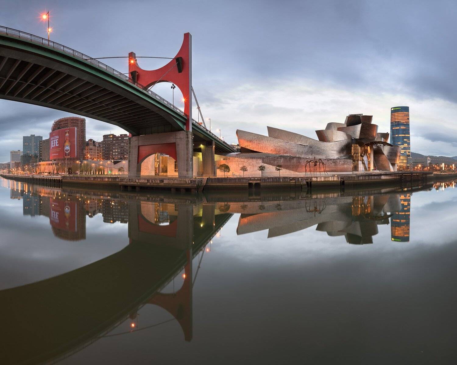 architecture, basque, bilbao, blue, bridge, building, canal, city, cityscape, country, dawn, embankment, europe, euskadi, exterior, facade, guggenheim, illuminated, landmark, metal, modern, monument, morning, museum, nevion, night, pano, panorama, pedestr, Andrey Omelyanchuk