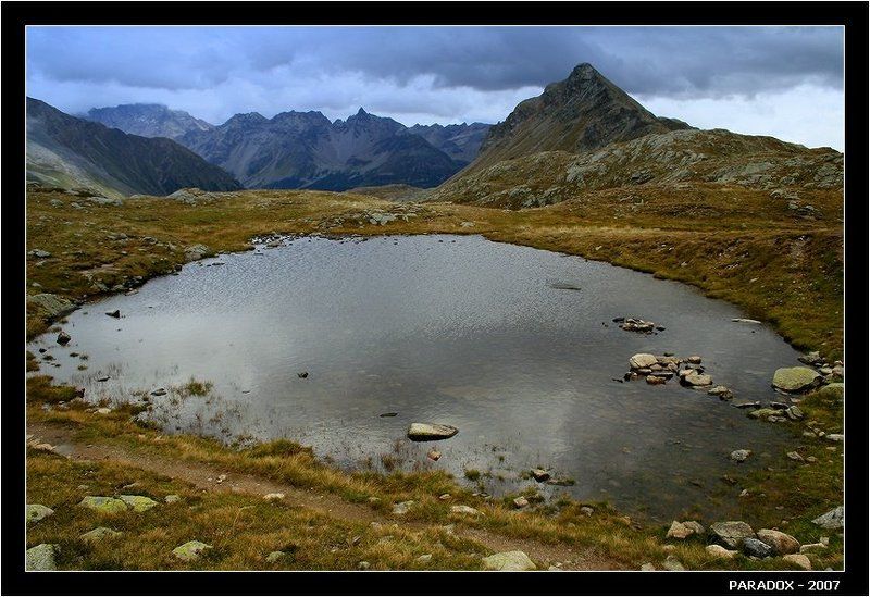 швейцария,перевал бернина,горы,озеро,тревожная тишина,paradox За перевалом - непогода фото превью