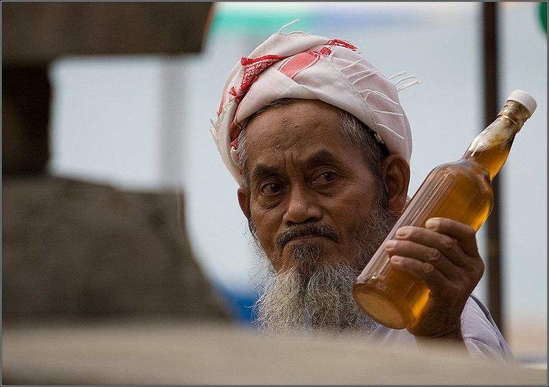 Торговец маслом фото превью