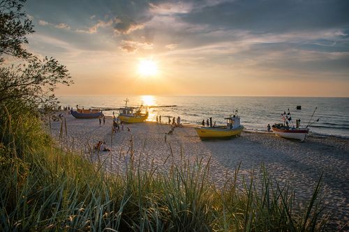 Fishing boats at sunset