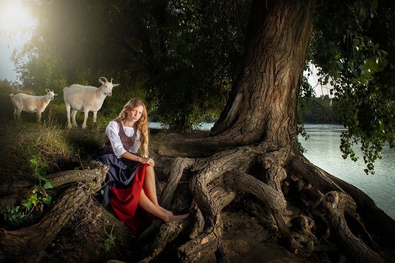 Girl with goats фото превью