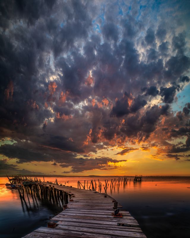 portugal,old pier,sunset,dramatic sky,water,long exposure,evening color,photopills,nikon,zeiss distagon dramatic evening фото превью