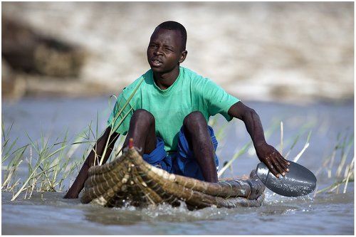 Торговец рыбой.