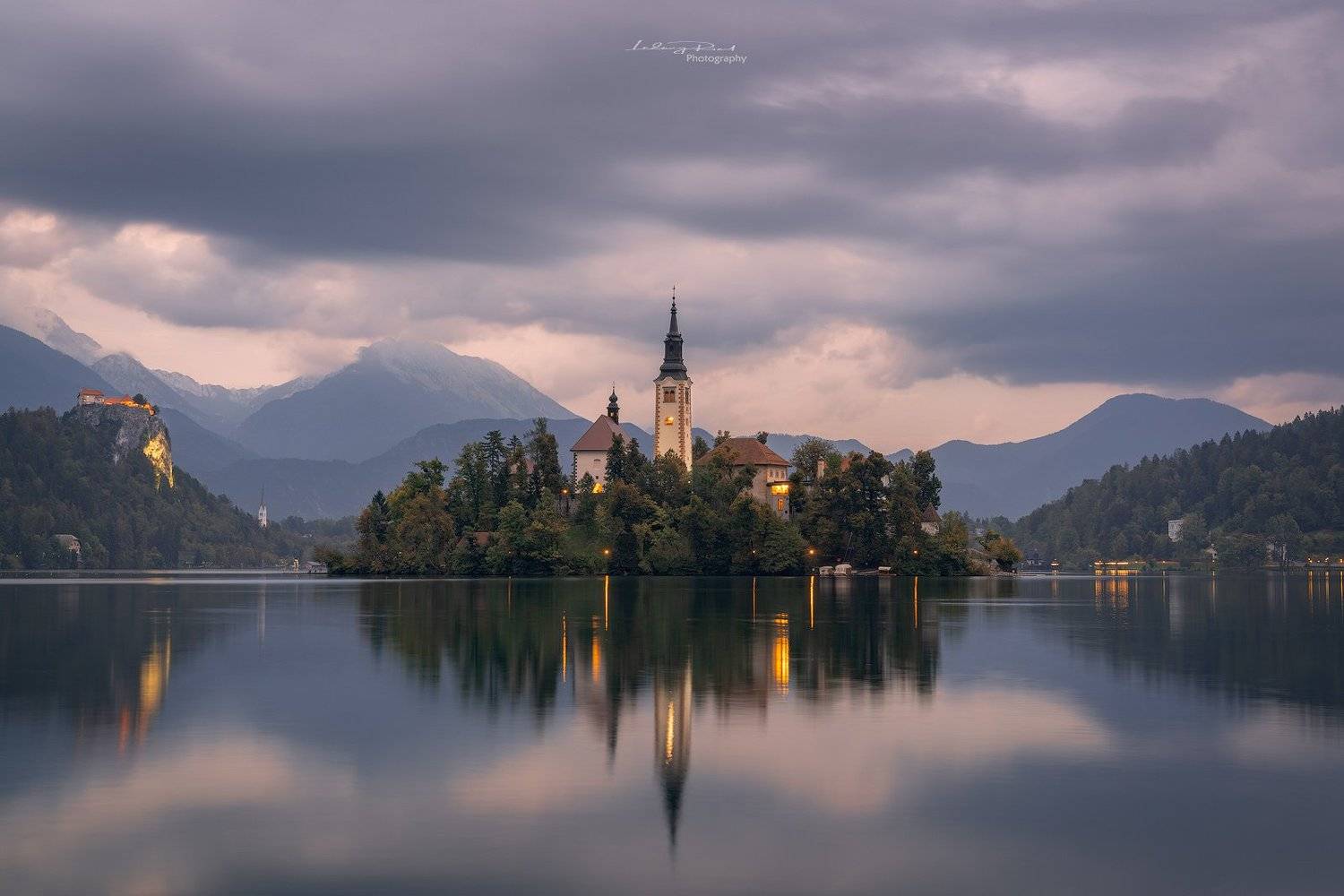 bled, blue, blue hour, calm waters, calmness, castle, church, church tower, cliff, clouds, evening, fog, forest, hills, island, lake, lake bled, lights, mountain range, mountains, reflections, rock, serenity, silence, sky, slovenia, tower, twilight, water, Ludwig Riml