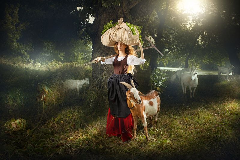 The young girl shepherding goats фото превью