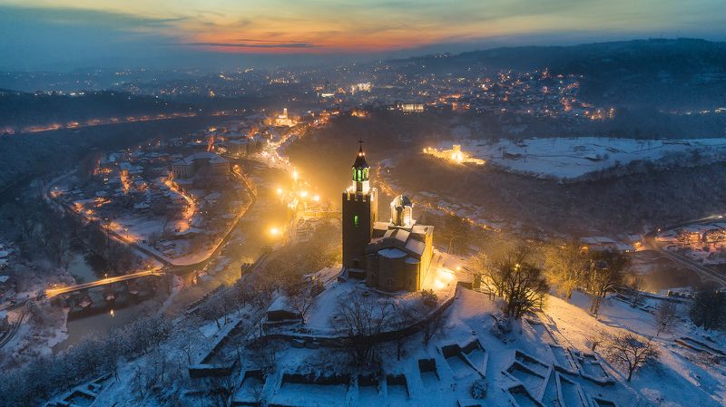 sunset, carevec, winter, night, lights, bulgaria, veliko tarnovo, drone, aerial view Sunset over Carevec fortress фото превью