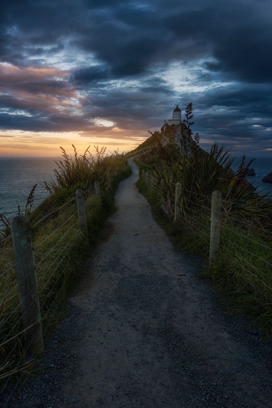 new zealand,sunset,lighthouse The Lighthouse фото превью