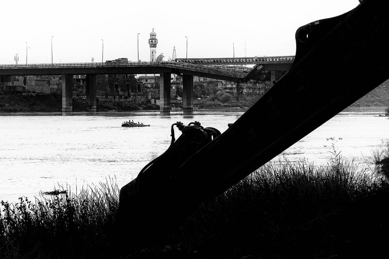 crushed bridge. powered by an emergency bridge., mohamad jalili