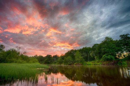 Sunset on Plussa river. Pskov region. Russia