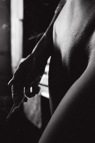 The smoke of the cigarette