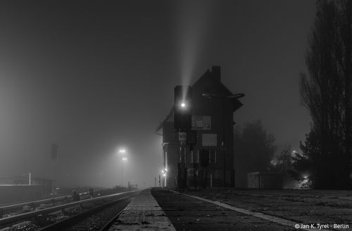 Historic Berlin station at foggy night
