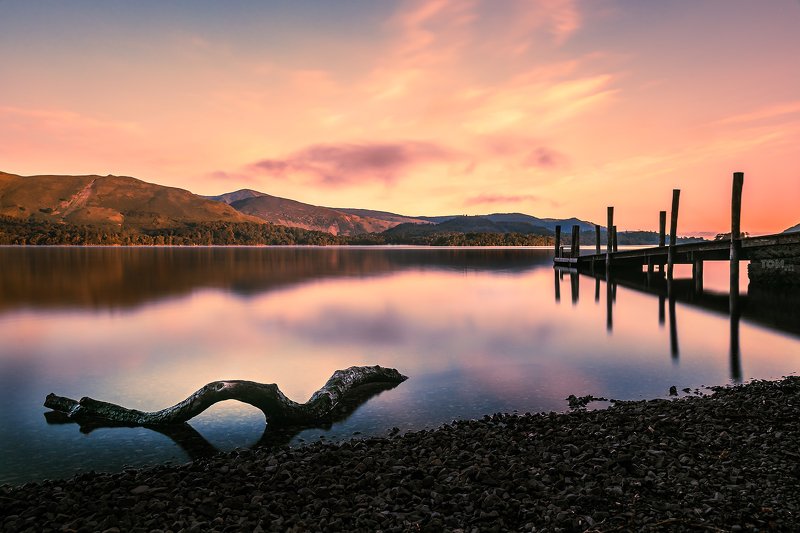 sunrise water jetty bridge reflection branch tree purple magenta orange england lake lakedistrict  \