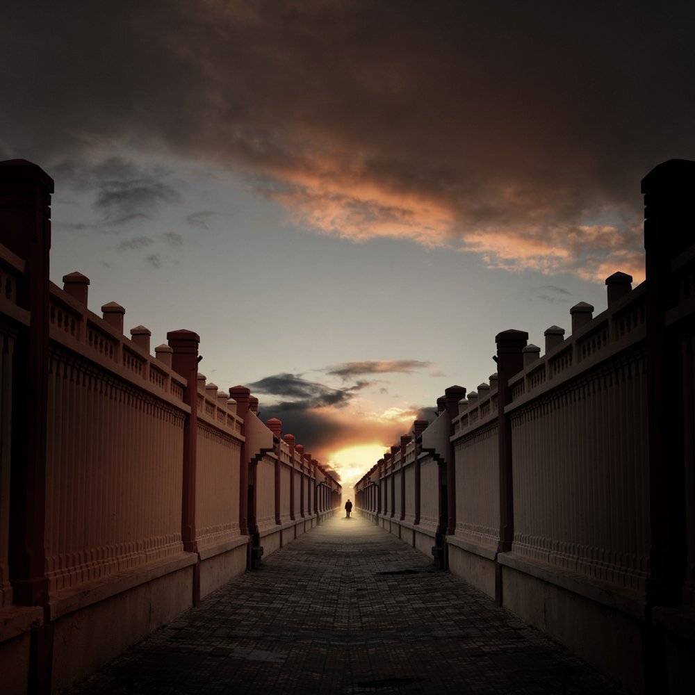 walls,stone,brick,man,sky,light,clouds,walking,alone, Caras Ionut