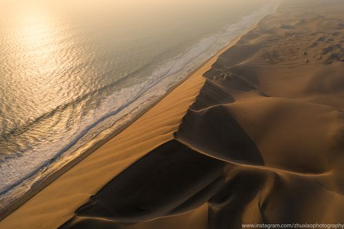 Sand dunes and sea