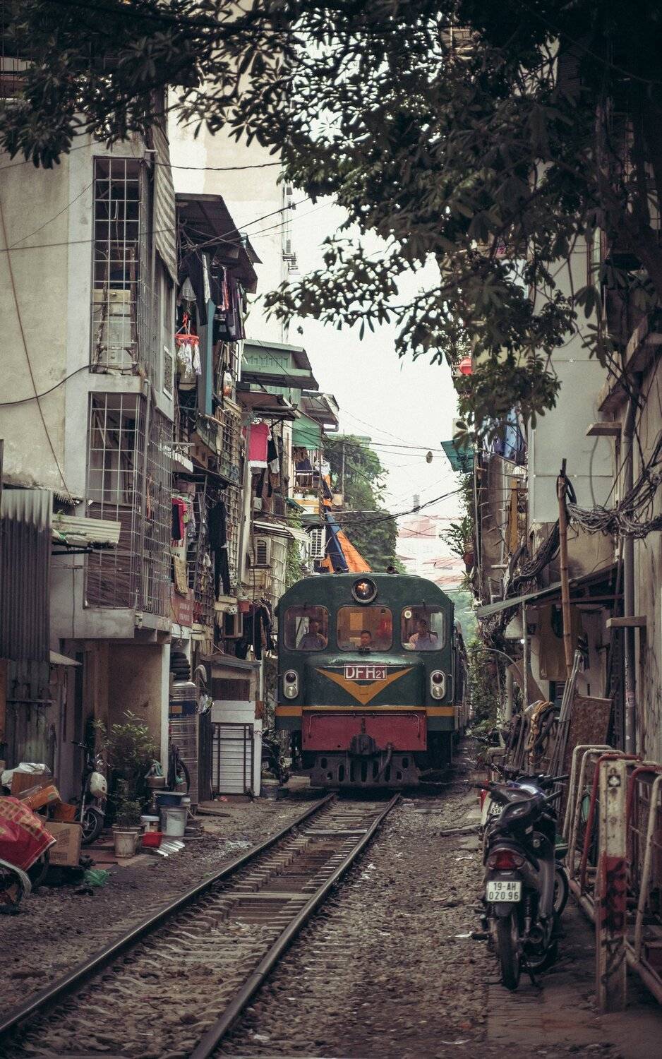 train hanoi vietnam street, Dmitry Leonov