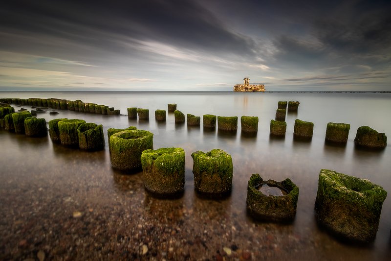 #landscape #seascape #waterscape #reflection #calm #sky #clouds #stones #canon #longexposure #nature #beautiful #colorful #jetty #seaweed #wood #dusk Torpedownia фото превью