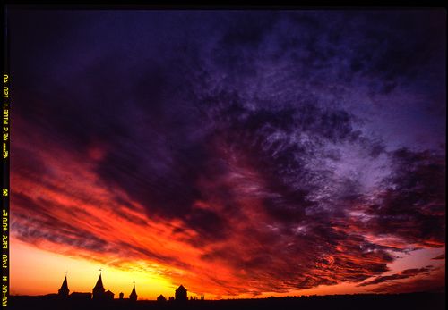 medieval castle or stronghold silhouette and beautiful sunset. Tourism in Europe