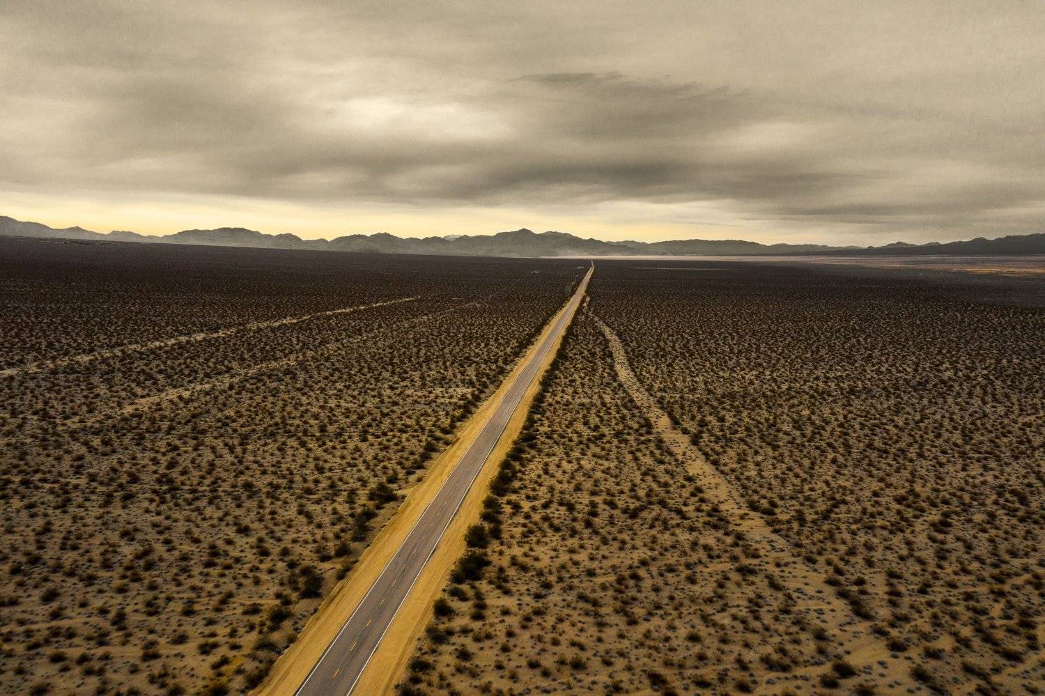 nevada ,usa ,america ,road ,desert ,desertroad ,straightroad ,clouds ,storm ,mountains ,landscape ,drone ,sepia ,moody ,onedirection ,linesinsand ,desertlines ,lonelyroad ,highway ,unitedstates ,unitedstateshighway ,northamerica ,exploredeserts ,northamer, Marko Radovanovic