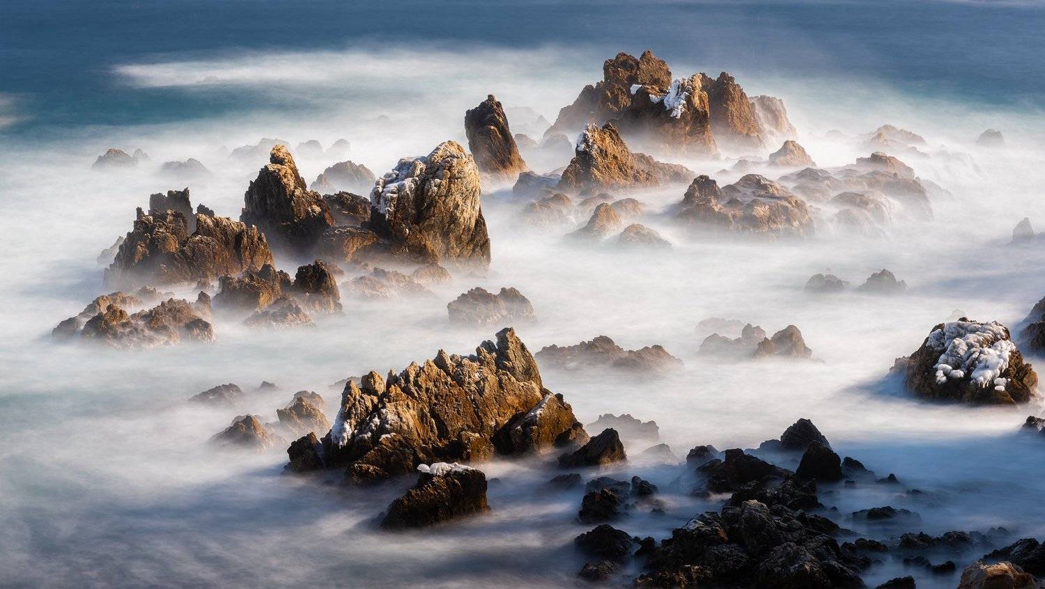 rocks,clouds,mountain,range,peak,snow,fog,rugged,winter,sea, Jaeyoun Ryu