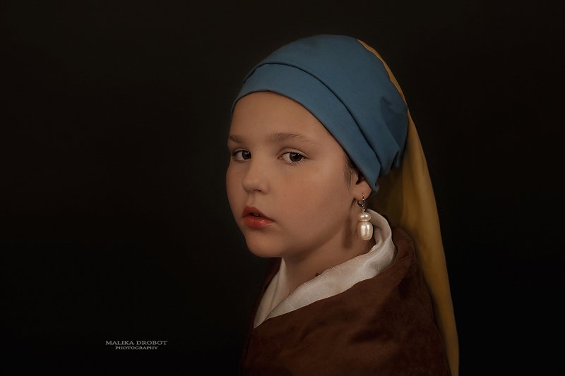 Девушка с жемчужной сережкой фото превью