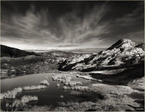 Растаял в далёком тумане Рыбачий - родимая наша земля...
