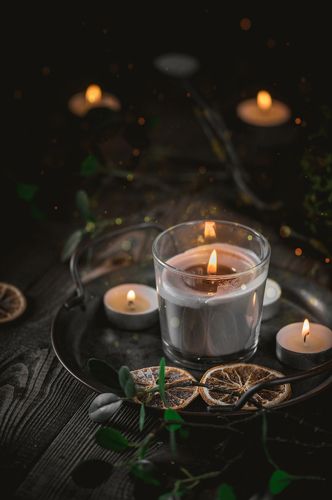 Candles on wooden table