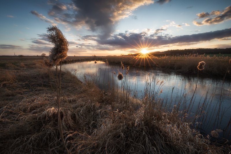 sky spring river sunset sunstar poland podlasie water clouds The whisps of Supraśl river... фото превью