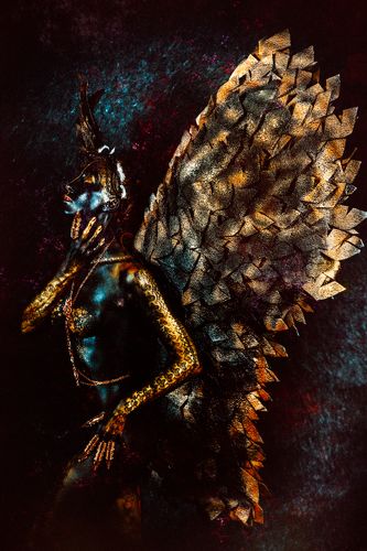 Her wings are black and Her soul is free