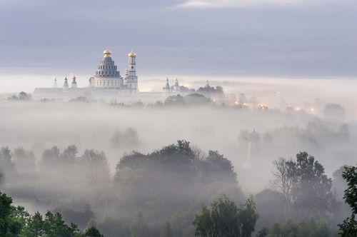В облаках.