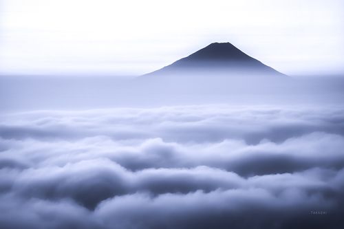 The world above the thin sea of clouds