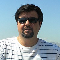 Портрет фотографа (аватар) Halit Dokuzoğuz